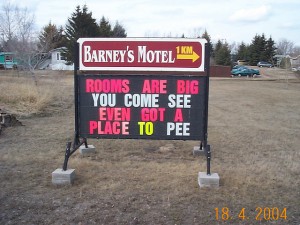 barneys motel sign - rooms are big, you come see, even got a room to pee 