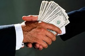 Handshake with cash